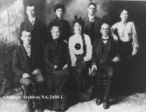 Remarks: L-Rback row: Michael Copps Costello, medical doctor, mayor; Katherine "Kate" Mary Costello, later Mrs. Thomas A. McManus; Doctor Tom Costello, medical doctor; Mary "Molly" Josephine Costello, later Mrs. S. A. McDonald. L-R front row: William "Bill" Costello; Elizabeth Copps Costello; Elizabeth Lillian Costello, later Mrs. Cory; John William Costello.